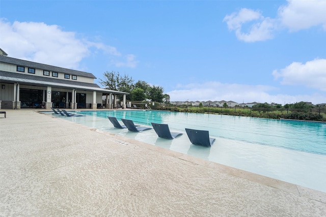 4101 Split Ivy Dr, Houston, TX 77080 - community pool featuring a patio area