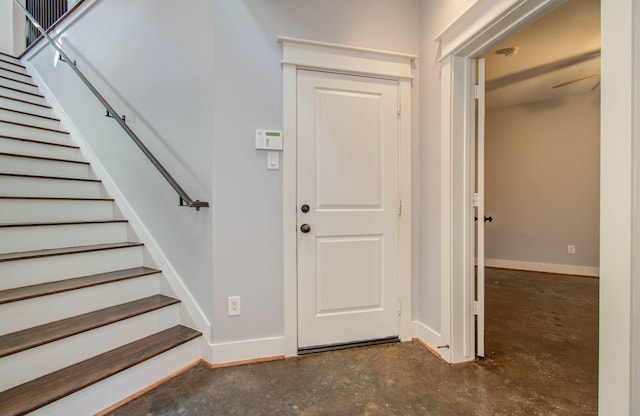 517 Fowler St, Houston, TX 77007 - entryway featuring concrete flooring and stairway
