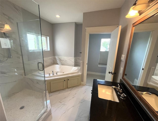 517 Fowler St, Houston, TX 77007 - full bathroom with marble look tiles, vanity, a marble finish shower, a garden tub, and plenty of natural light