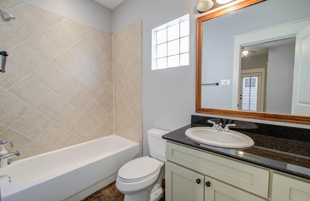 517 Fowler St, Houston, TX 77007 - bathroom featuring vanity, plenty of natural light, washtub / shower combination, and ceiling fan
