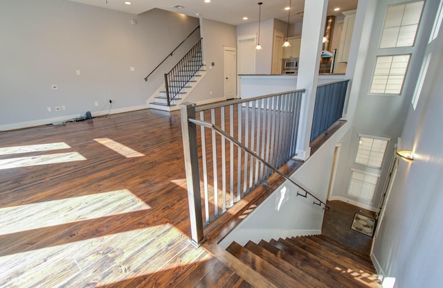 517 Fowler St, Houston, TX 77007 - stairs featuring wood finished floors and recessed lighting