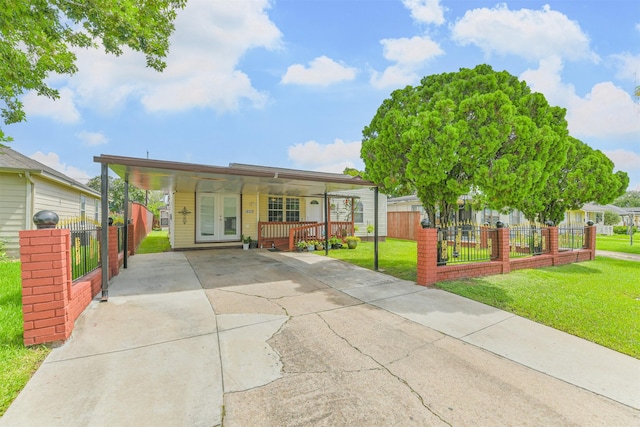 10329 Fairfax St, Houston, TX 77029 - view of front of property with driveway, covered porch, and french doors