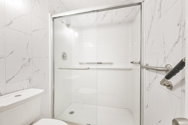 10329 Fairfax St, Houston, TX 77029 - full bathroom featuring toilet and a shower stall
