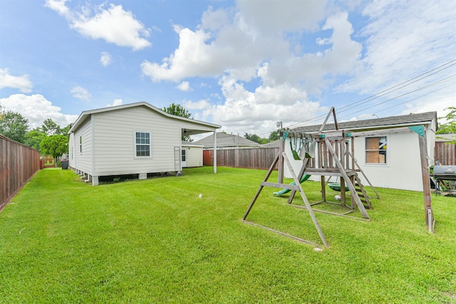 10329 Fairfax St, Houston, TX 77029 - fenced backyard featuring a playground