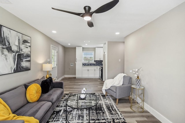 1000 W Thomas Ave, Pasadena, TX 77506 - living room with light wood-style flooring, a ceiling fan, and recessed lighting