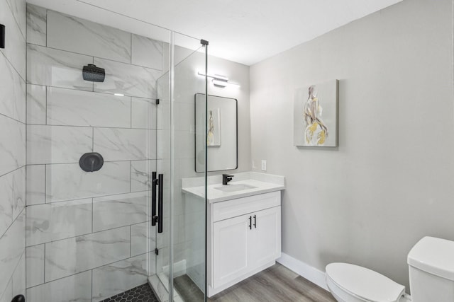 1000 W Thomas Ave, Pasadena, TX 77506 - bathroom with a shower stall, vanity, and wood finished floors