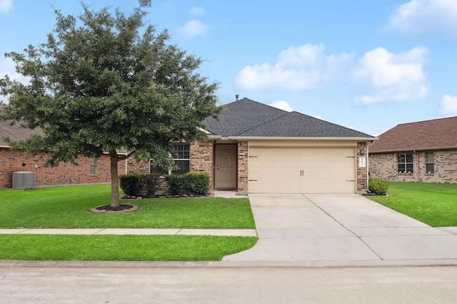 9618 Paloma Creek Dr, Tomball, TX 77375 - view of front of house featuring a garage, concrete driveway, a front yard, and brick siding