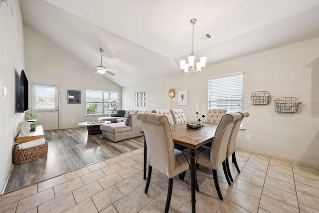 9618 Paloma Creek Dr, Tomball, TX 77375 - dining space with a chandelier, light tile patterned floors, ceiling fan, and high vaulted ceiling