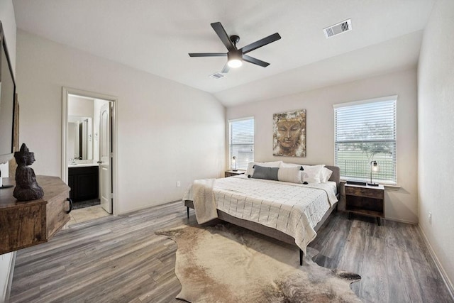 9618 Paloma Creek Dr, Tomball, TX 77375 - bedroom with wood finished floors, lofted ceiling, a ceiling fan, and ensuite bath