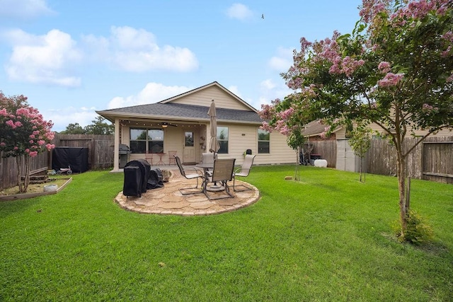 9618 Paloma Creek Dr, Tomball, TX 77375 - rear view of property with ceiling fan, a fenced backyard, a patio area, and a shingled roof