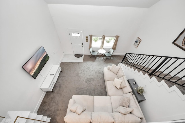 10747 Dulcimer St, Houston, TX 77051 - carpeted living area with stairs and baseboards