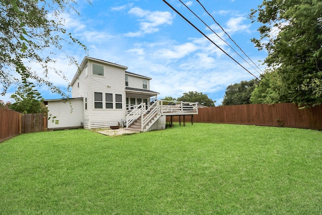 10747 Dulcimer St, Houston, TX 77051 - rear view of property with a fenced backyard, stairs, and a wooden deck
