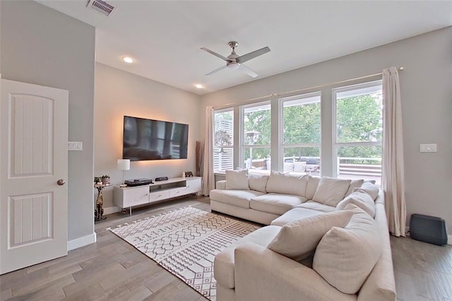10747 Dulcimer St, Houston, TX 77051 - living area featuring ceiling fan, light wood-style flooring, and recessed lighting