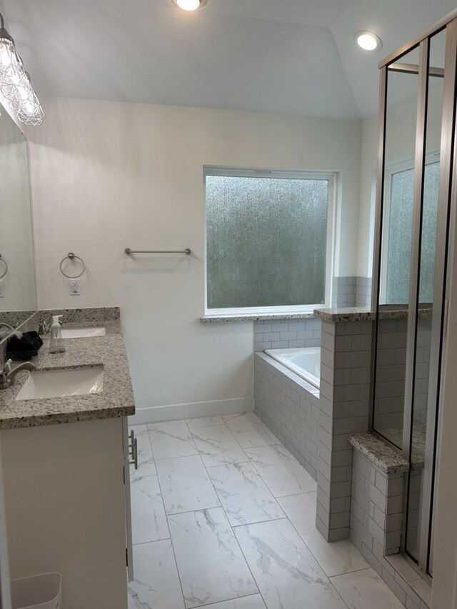 10747 Dulcimer St, Houston, TX 77051 - bathroom featuring double vanity, a garden tub, marble finish flooring, recessed lighting, and a shower with door