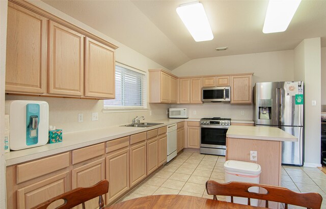 21515 Oak Park Trails Dr, Katy, TX 77450 - kitchen with appliances with stainless steel finishes, light brown cabinetry, light tile patterned floors, lofted ceiling, and light countertops