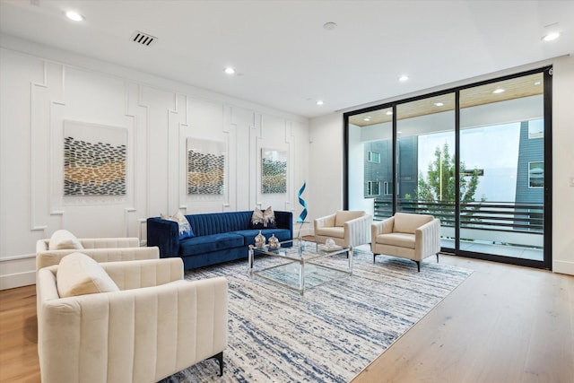 507 W Bell, Houston, TX 77019 - living area with wood finished floors and recessed lighting