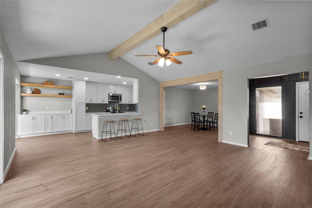 1905 Fairfield Ct S, League City, TX 77573 - living room featuring a ceiling fan, light wood-style floors, and recessed lighting