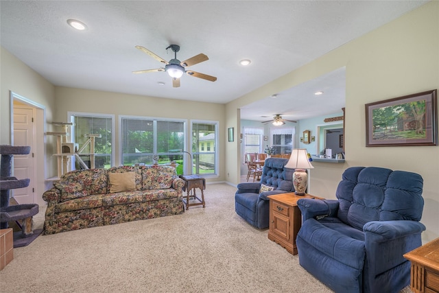 7027 Kurt Dr, Brenham, TX 77833 - living room featuring a ceiling fan, light carpet, and recessed lighting