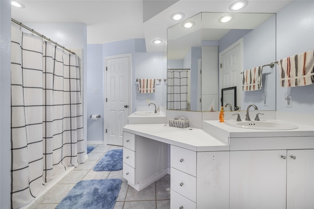 7027 Kurt Dr, Brenham, TX 77833 - bathroom featuring vanity, tile patterned flooring, a shower with shower curtain, and recessed lighting