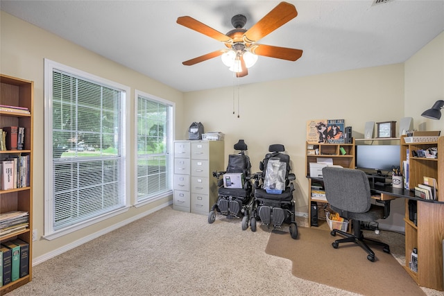 7027 Kurt Dr, Brenham, TX 77833 - carpeted home office featuring a ceiling fan and baseboards