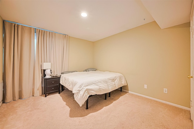 1860 White Oak Dr Unit 334, Houston, TX 77009 - bedroom featuring light carpet and recessed lighting