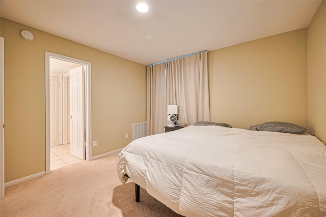 1860 White Oak Dr Unit 334, Houston, TX 77009 - carpeted bedroom with baseboards