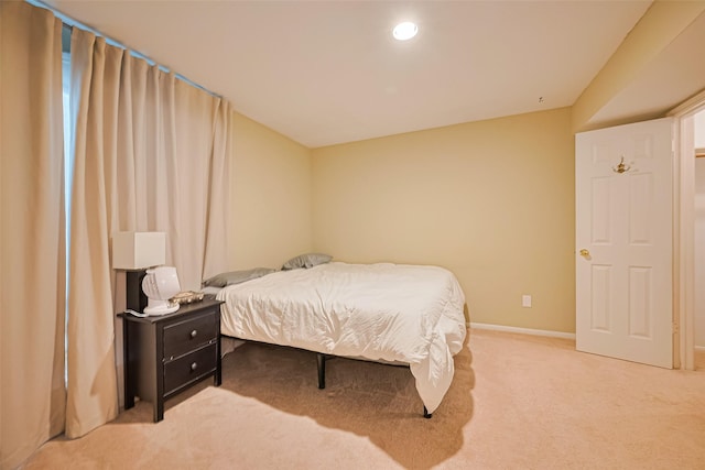1860 White Oak Dr Unit 334, Houston, TX 77009 - bedroom with light colored carpet and recessed lighting