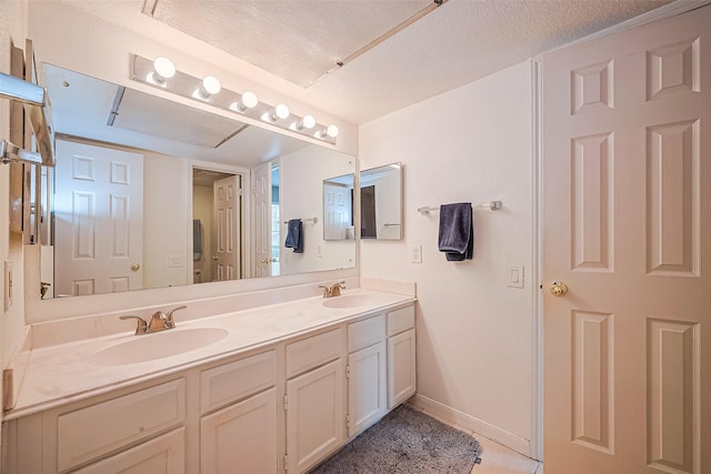 1860 White Oak Dr Unit 334, Houston, TX 77009 - bathroom with double vanity and tile patterned floors