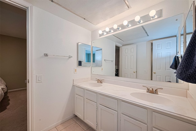 1860 White Oak Dr Unit 334, Houston, TX 77009 - full bathroom with double vanity and tile patterned floors