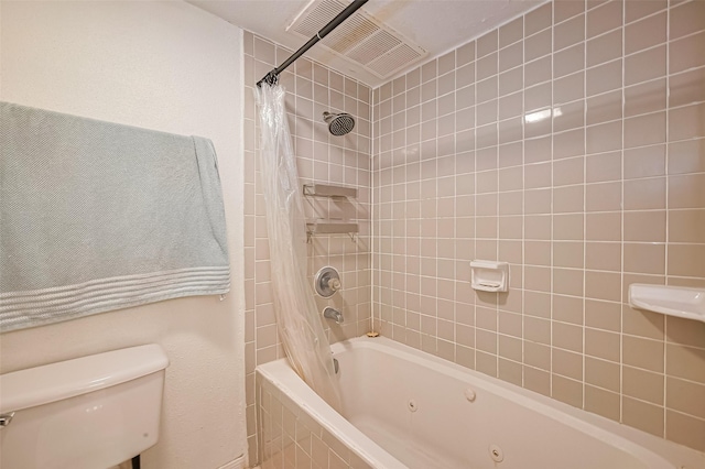 1860 White Oak Dr Unit 334, Houston, TX 77009 - bathroom with a combined bath / shower with jetted tub and toilet