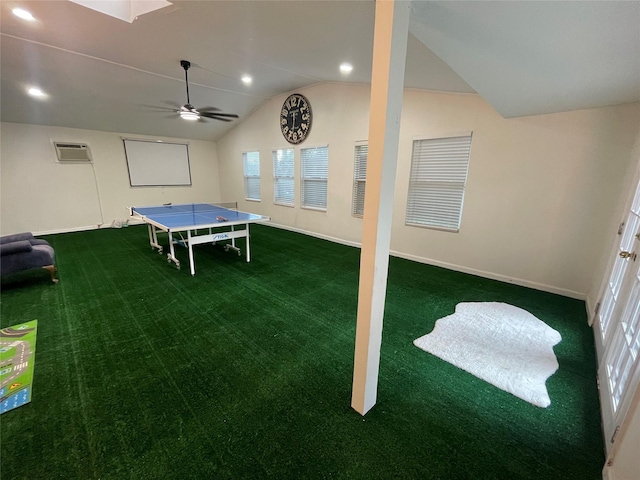12834 Tosca Ln, Houston, TX 77024 - playroom with carpet flooring, vaulted ceiling, healthy amount of natural light, a wall mounted AC, and recessed lighting