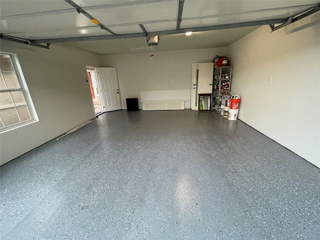 12834 Tosca Ln, Houston, TX 77024 - garage featuring a garage door opener
