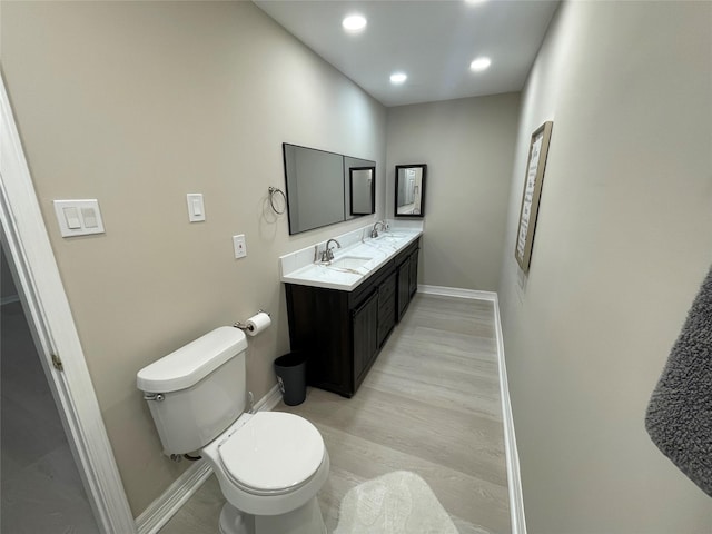 12834 Tosca Ln, Houston, TX 77024 - bathroom with double vanity and recessed lighting