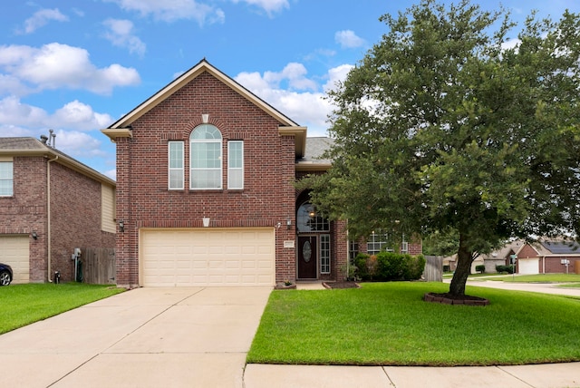 3202 Stoneydale Ln, Spring, TX 77388 - traditional-style house featuring driveway, a garage, a front yard, and brick siding