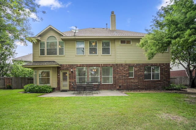 16407 Bogan Flats Ct, Houston, TX 77095 - back of house featuring brick siding, a chimney, a patio, and roof with shingles
