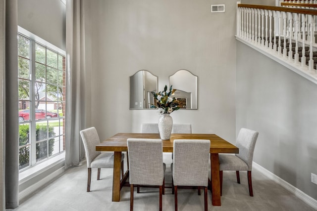 16407 Bogan Flats Ct, Houston, TX 77095 - carpeted dining room with a towering ceiling