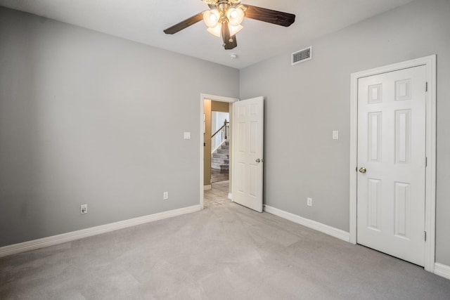 16407 Bogan Flats Ct, Houston, TX 77095 - unfurnished bedroom with light carpet and ceiling fan