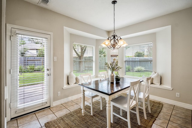 16407 Bogan Flats Ct, Houston, TX 77095 - dining room with a chandelier, healthy amount of natural light, and light tile patterned floors