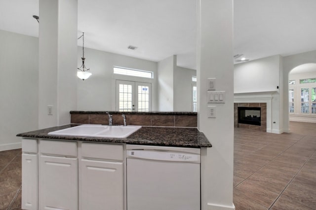 4734 Cashel Glen Dr, Houston, TX 77069 - kitchen featuring white dishwasher, white cabinets, dark stone counters, and french doors