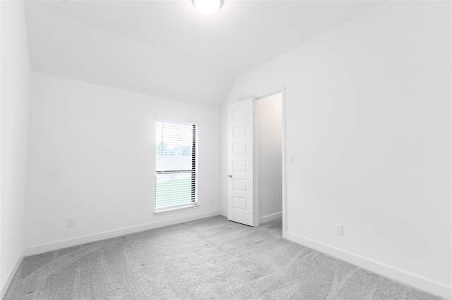 14811 Opossum Branch Ct, Cypress, TX 77433 - spare room featuring carpet flooring and lofted ceiling