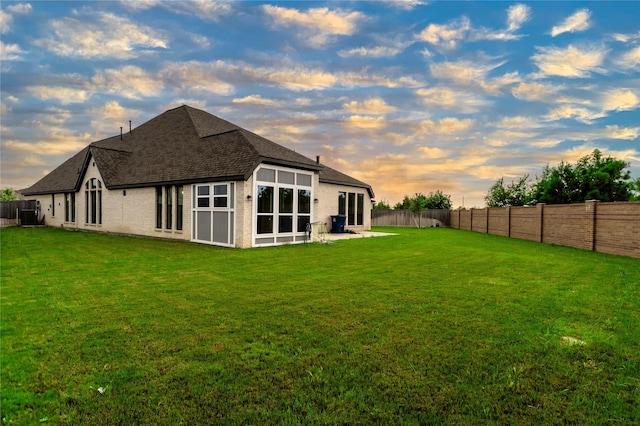 14811 Opossum Branch Ct, Cypress, TX 77433 - back of property with a fenced backyard and a shingled roof