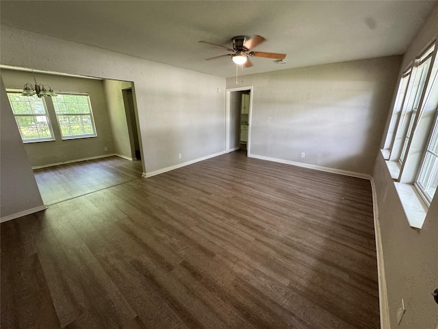 2222 8th St, Houston, TX 77547 - empty room featuring dark wood finished floors and a ceiling fan