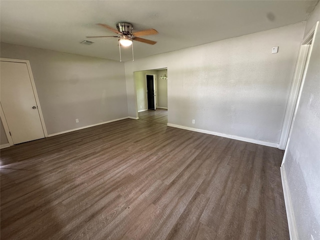 2222 8th St, Houston, TX 77547 - empty room with a ceiling fan and dark wood-type flooring