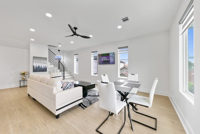 104 E 44th St Unit A, Houston, TX 77018 - living room with recessed lighting, light wood-type flooring, ceiling fan, and stairway