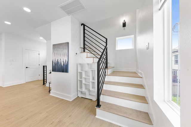 104 E 44th St Unit A, Houston, TX 77018 - stairs featuring wood finished floors and recessed lighting