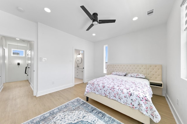 104 E 44th St Unit A, Houston, TX 77018 - bedroom with attic access, light wood-type flooring, recessed lighting, ceiling fan, and connected bathroom