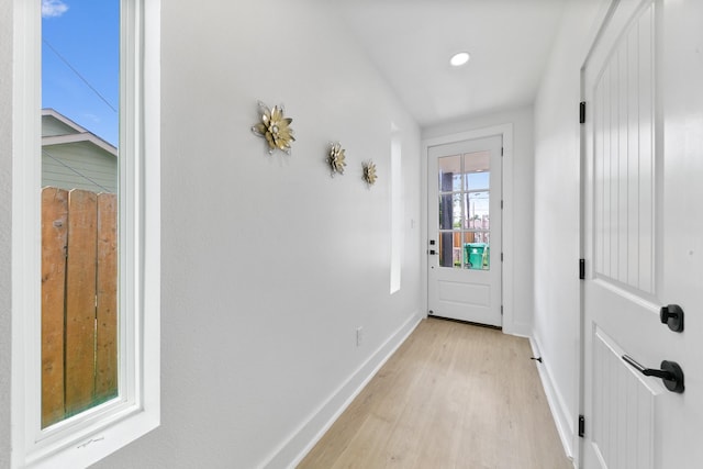 104 E 44th St Unit A, Houston, TX 77018 - entryway featuring light wood-style flooring and baseboards