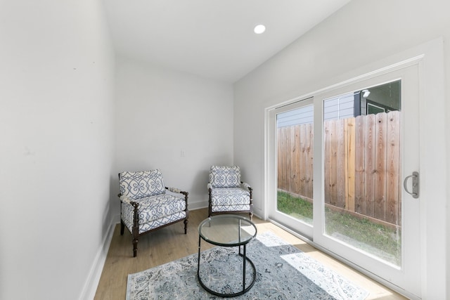 104 E 44th St Unit A, Houston, TX 77018 - living area featuring baseboards and wood finished floors