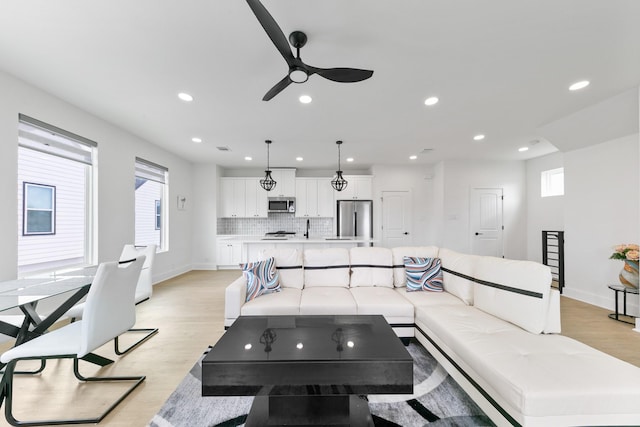 104 E 44th St Unit A, Houston, TX 77018 - living area with light wood-style flooring, recessed lighting, and a ceiling fan