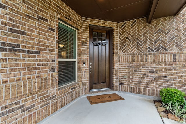 6303 Grand Drift Ct, Katy, TX 77494 - property entrance featuring brick siding and a porch